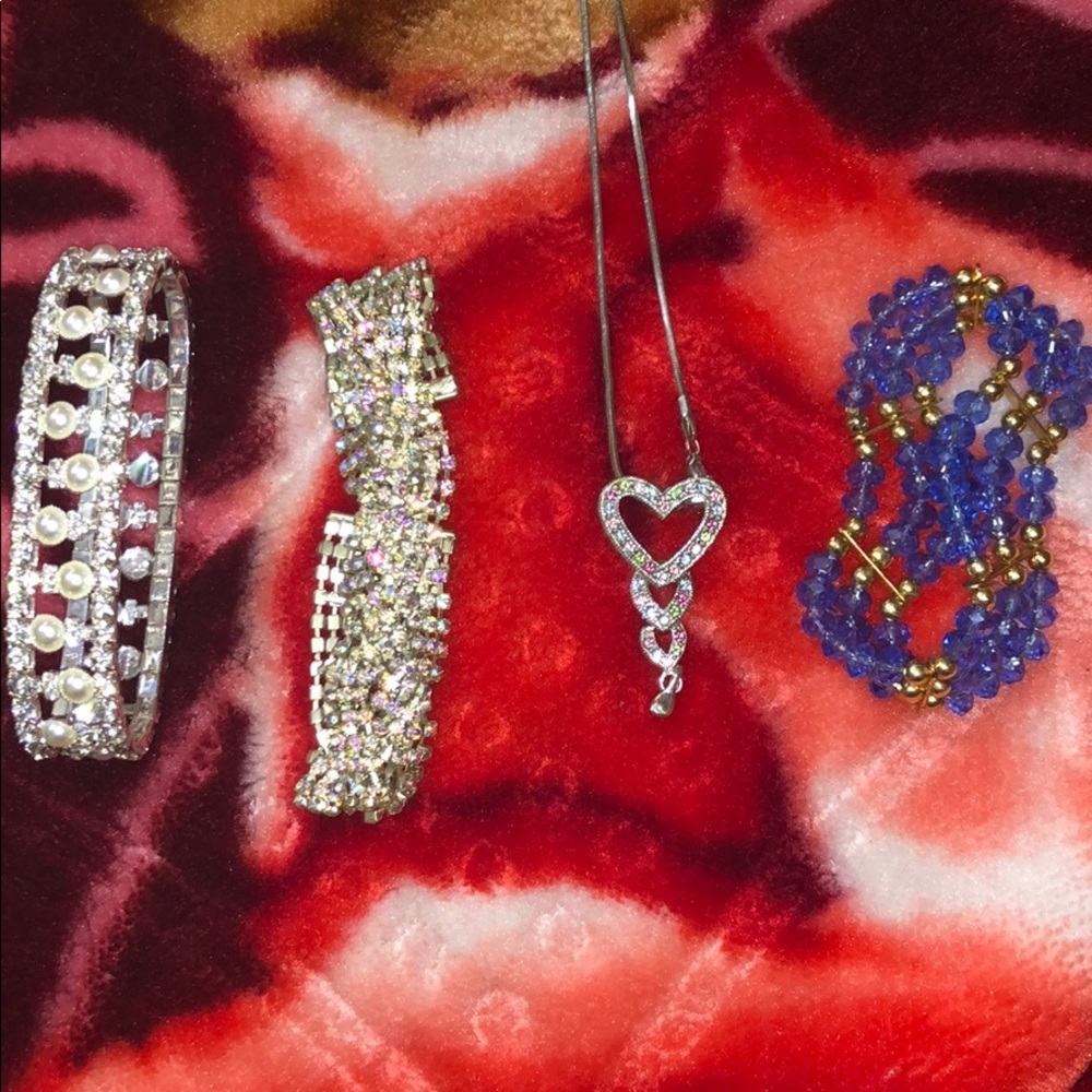 Bracelets and a necklace all come together